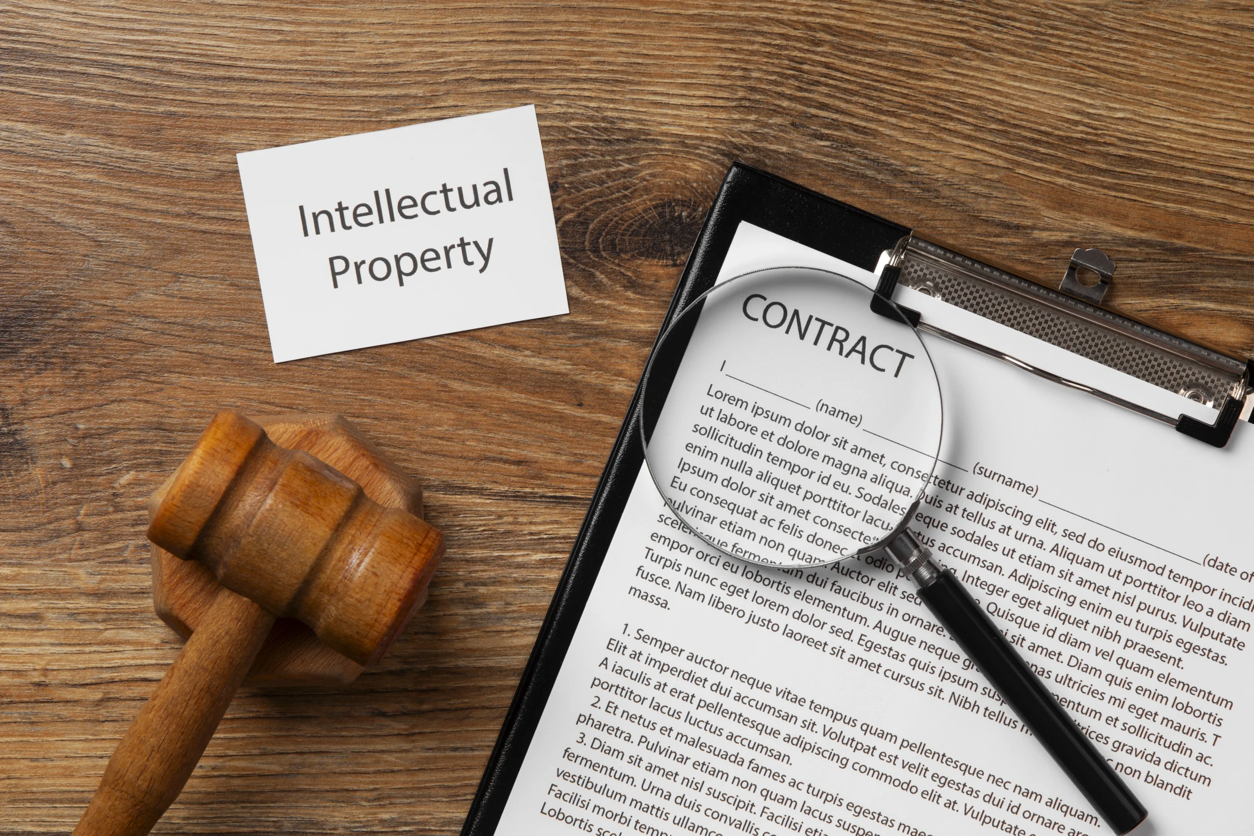 Legal contract text with magnifying glass and gavel representing real estate laws 2026 and property regulation reforms